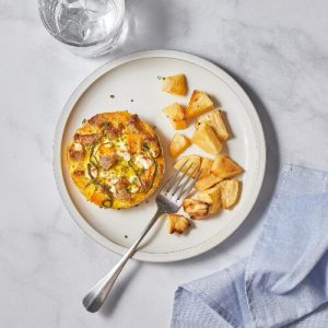 Azuluna Farms Squash Sausage Sage Frittata in a staged photo on a marble counter